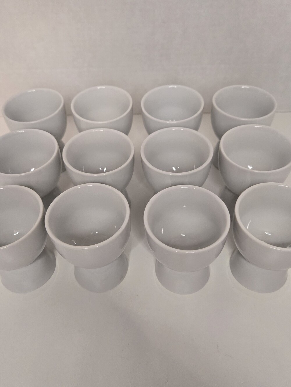 Set of 12 White Porcelain Double Egg Cups
